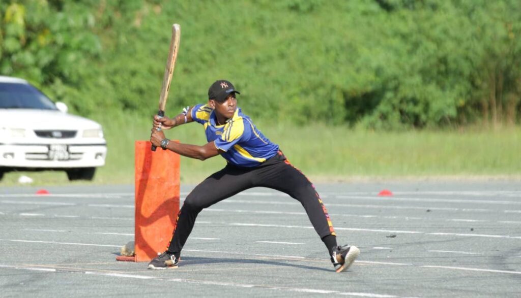 Roxborough United’s Jahron Alfred goes on the front foot to attack in a Tobago T10 Windball match at Parade Square, Bacolet on Sunday. - 
