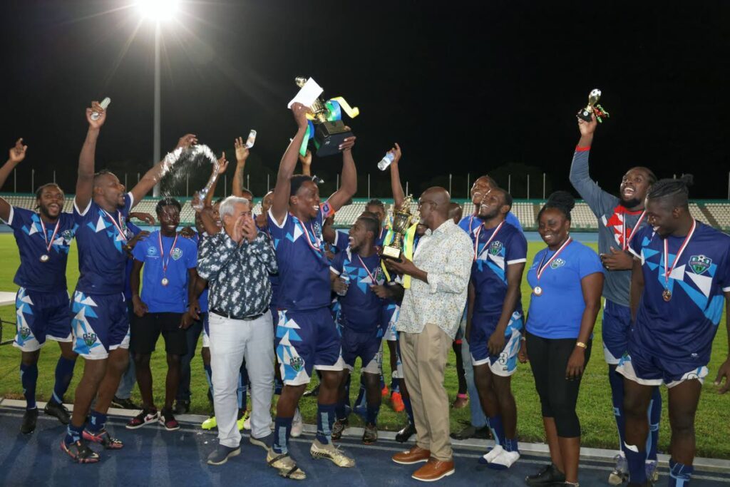 Stokely Vale players celebrate the Tobago Football Association knockout title at the Dwight Yorke Stadium, Bacolet, Saturday.  - 