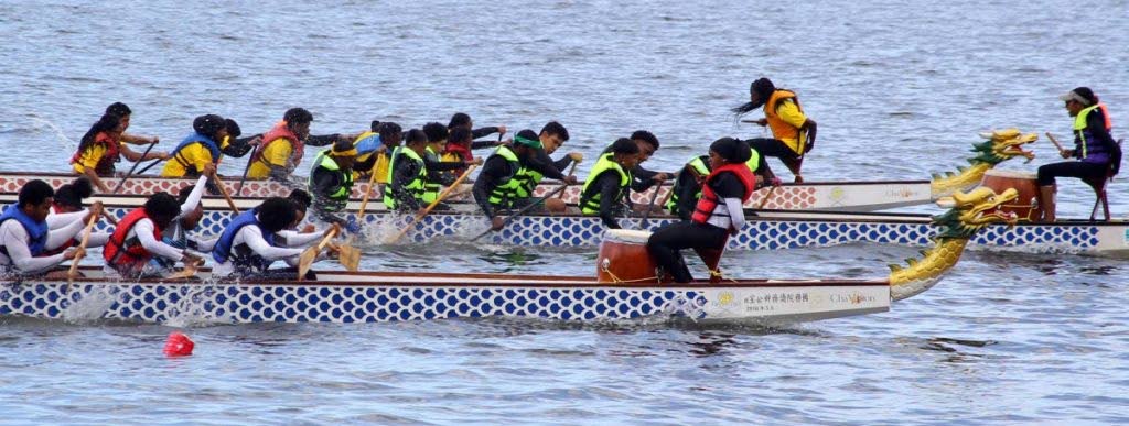 Action in the 2019  Chinese Bicentennial Dragon Boat Regatta, at the Boardwalk, Chaguaramas. - 