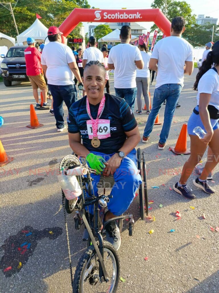 Gerard Asyn hand-cycled the Scotiabank Women Against Breast Cancer 5K on Saturday.  - 