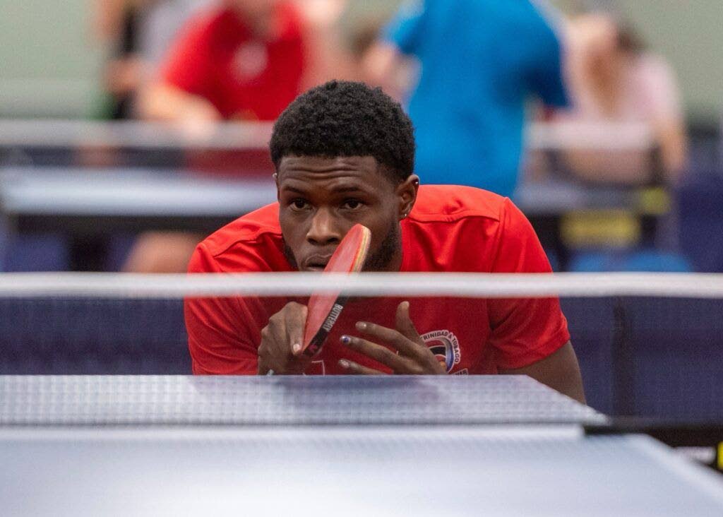 TT's Aaron Wilson shows extreme focus during his silver medal performance at a table tennis tournament in Copenhagen, Denmark, recently. - 