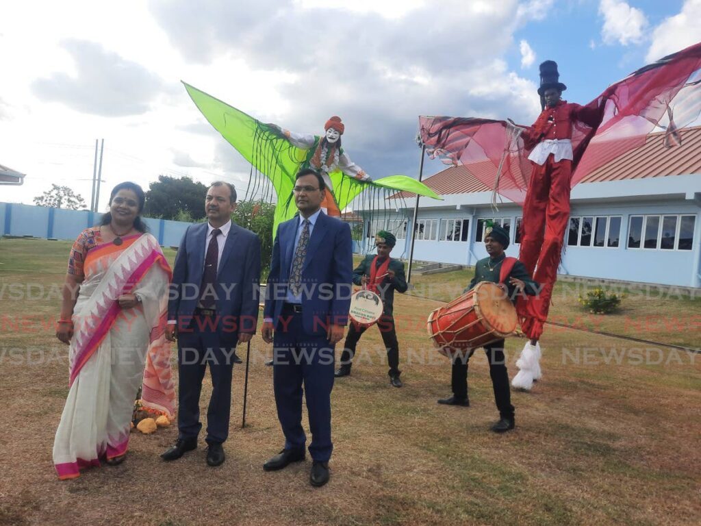 Indian High Commissioner to TT Dr Pradeep Rajpurohit (right), Indian Council for Cultural Relations (ICCR) director general Kumar Tuhin and Mahatma Gandhi Institute for Cultural Cooperation director Ramya Ajay pose for the media before a tour of the Centre in Mt Hope on October 12. - Paula Lindo