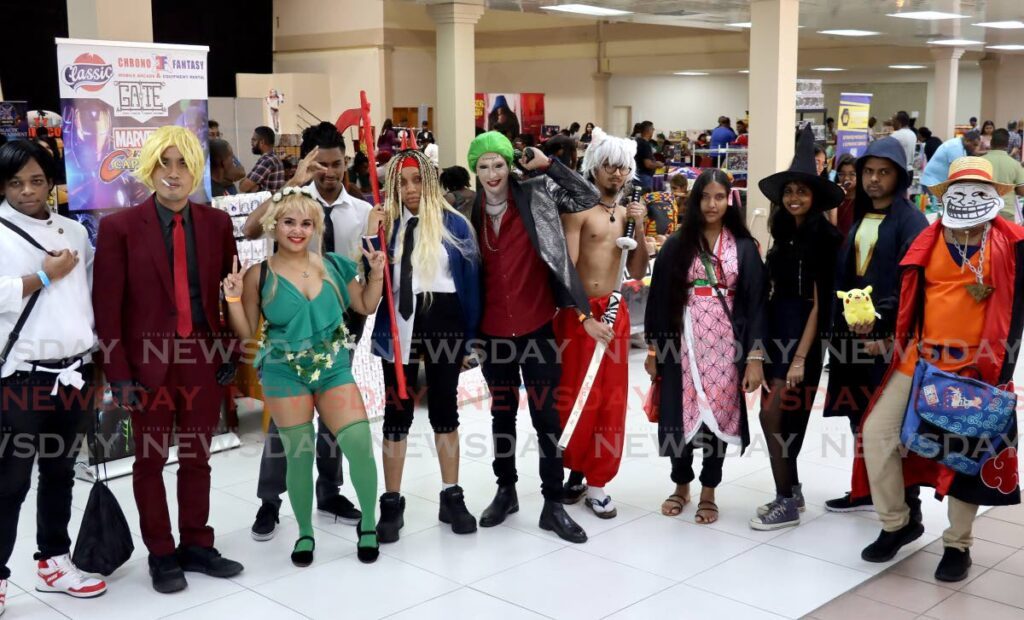  Cosplayers strike a pose during TT Comicon held on October 14 at the Centre of Excellence, Macoya.  - ROGER JACOB