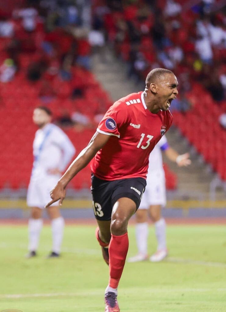 TT forward Reon Moore celebrates after scoring against Guatemala in a Concacaf Nations League match on Friday at the Hasely Crawford Stadium, Mucurapo. - TTFA