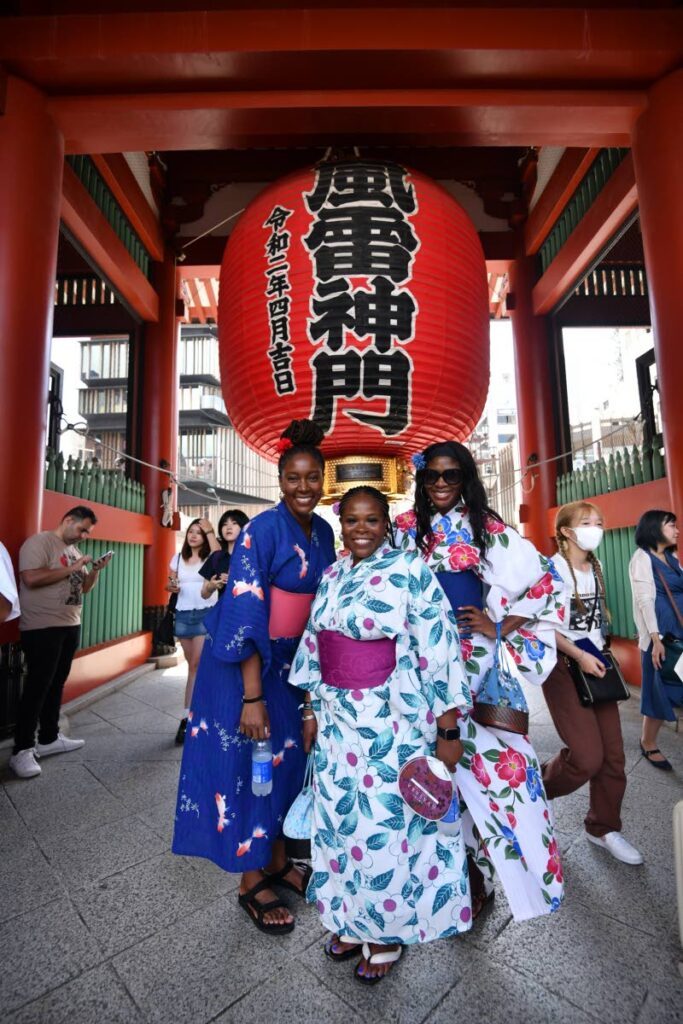 Travellers to Soca in Japan in front of Sensoji Temple during a tour of Asasuka City, Tokyo Japan. - 