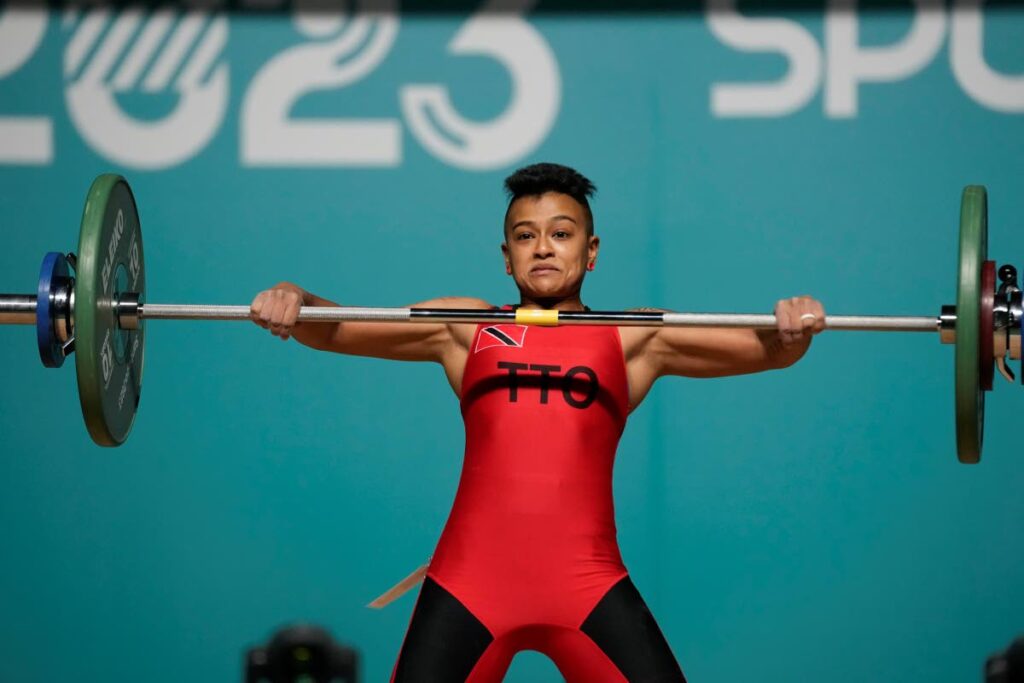 TT's Karin Sigh competes in the women's weightlifting 49Kg at the Pan American Games in Santiago, Chile, on Saturday. - AP PHOTO