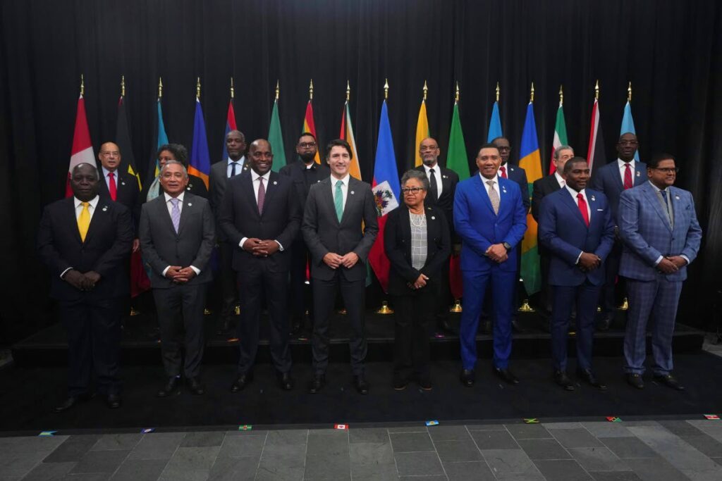 Canadian Prime Minister Justin Trudeau and Caribbean leaders pose for a group photo at the Canada-Caricom summit in Ottawa, Canada on October 18. via AP - 