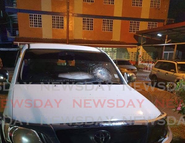VIOLENT ACT: The windscreen of this pick-up, belonging to a Hindu worshipper, was smashed outside the Pranavananda Ashram in Freeport on Sunday.  - 