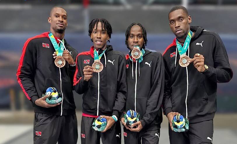 TT 3x3 men's basketballers (from left) Chike Augustine, brothers Ahkeel and Ahkeem Boyd, and Moriba de Freitas with their Pan Am Games bronze medals in Santiago, Chile.  - 