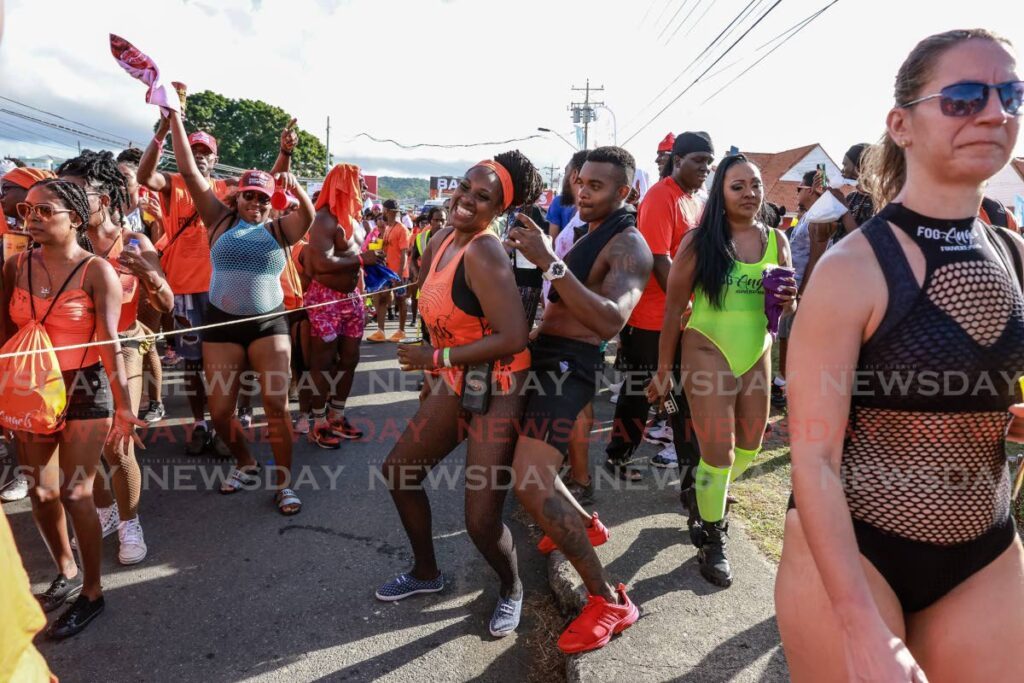 J'Ouvert revellers during J'Ouvert celebrations in Tobago on Saturday. - Photo by Jeff K. Mayers
