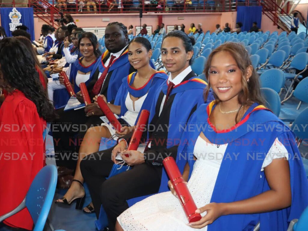  Kirsten Paige St Omer, Vinaya Boodram, Clayton Knott, Britanny Mahabir and Nand Sookhan, are the first group of graduates from the faculty of Sport at UWI St Augustine. - Photo by Roger Jacob