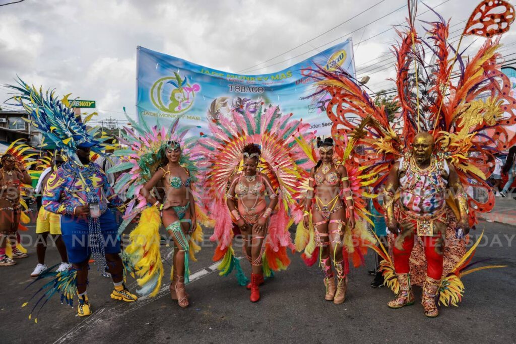 Masqueraders from Jade Monkey Mas during the parade of the bands in Scarborough on Sunday.  - Jeff K. Mayers