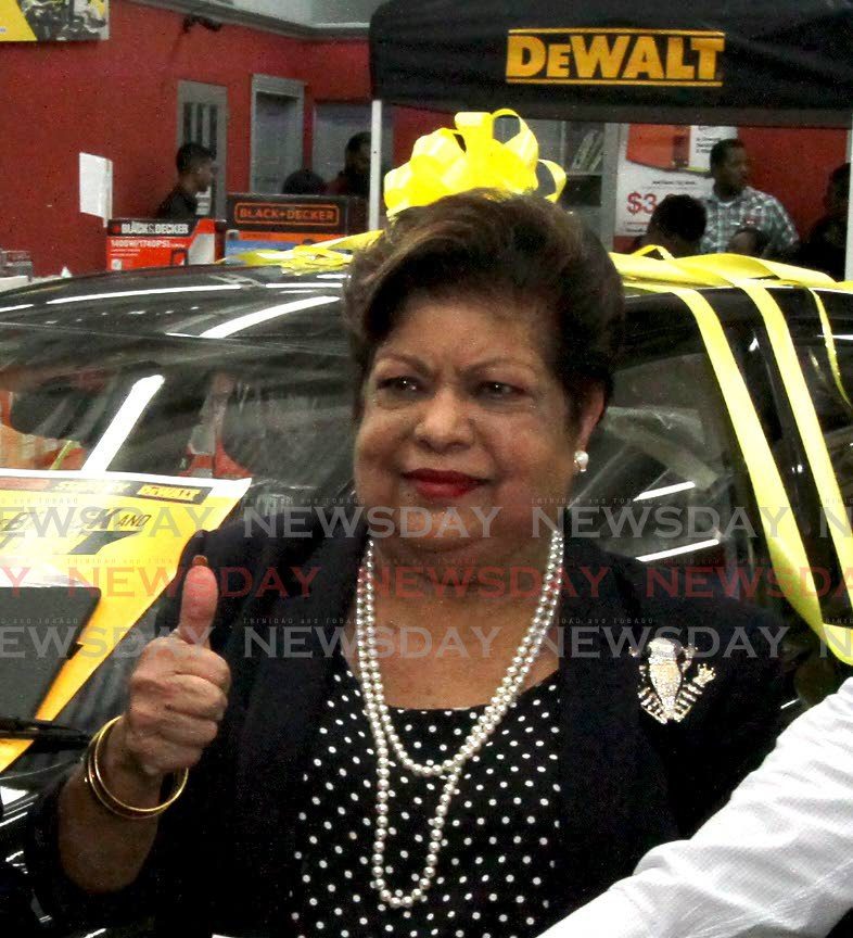 A BUSINESS ICON: Helen Bhagwansingh during a promotion at the Bhagwansingh’s Sea Lots 
compound on August 4, 2017.  Bhagwansingh died on Monday.  - FILE PHOTO 
