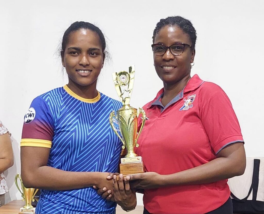 QPCC's Brittney Joseph, left, is all smiles after winning the Trinabgo Open Champs women's singles title.  - 