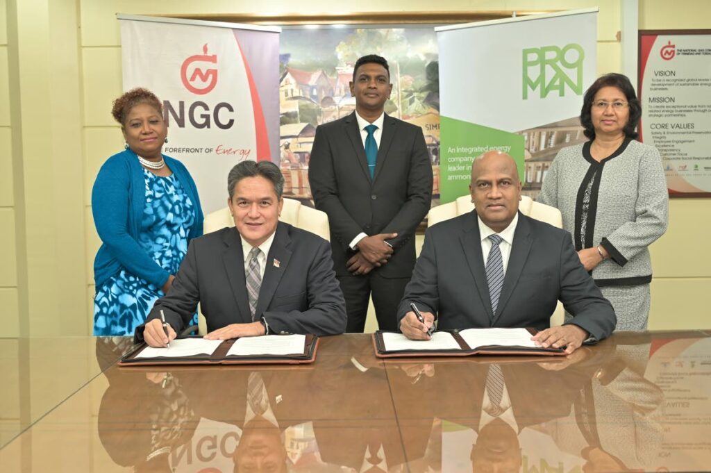 Seated: NGC president Mark Loquan, left and CNC and N2000 managing director Jerome Dookie.
Standing: NGC VP commerical Verlier Quan Vie; NGC commercial manager, midstream/downstream petchem. operations Anderson Ramlochan; and CNC financial controller Lynda Boodoo.
Photo courtesy NGC - 