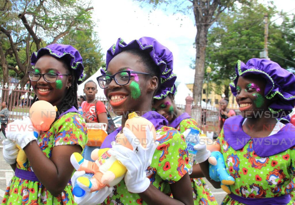 The Togetherness Community Group get in character while enjoying themseleves during the Carnival downtown parade in Port of Spain, on February 17. FILE PHOTO/AYANNA KINSALE - 
