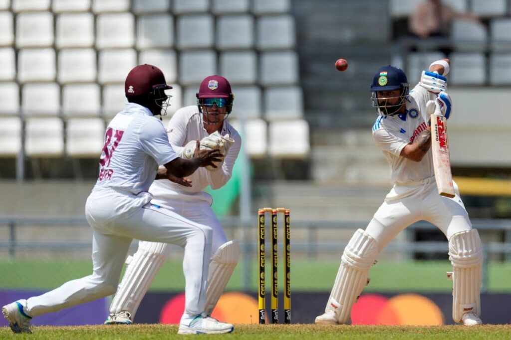 In this July 14 file photo, India's Virat Kohli eyes the ball after playing a shot off of the bowling of West Indies' Jomel Warrican on day three of their first Test at Windsor Park in Roseau, Dominica. - AP PHOTO