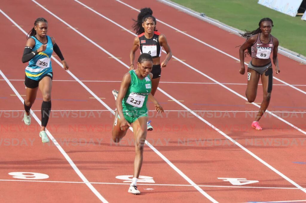 FLASHBACK: Nigeria's Kaith Okwose wins the women's 200m final at the Commonwealth Youth Games, Hasley Crawford Stadium on August 10, 2023.  TT's Sole Frederick, second from right, placed third. - Photo by Angelo Marcelle