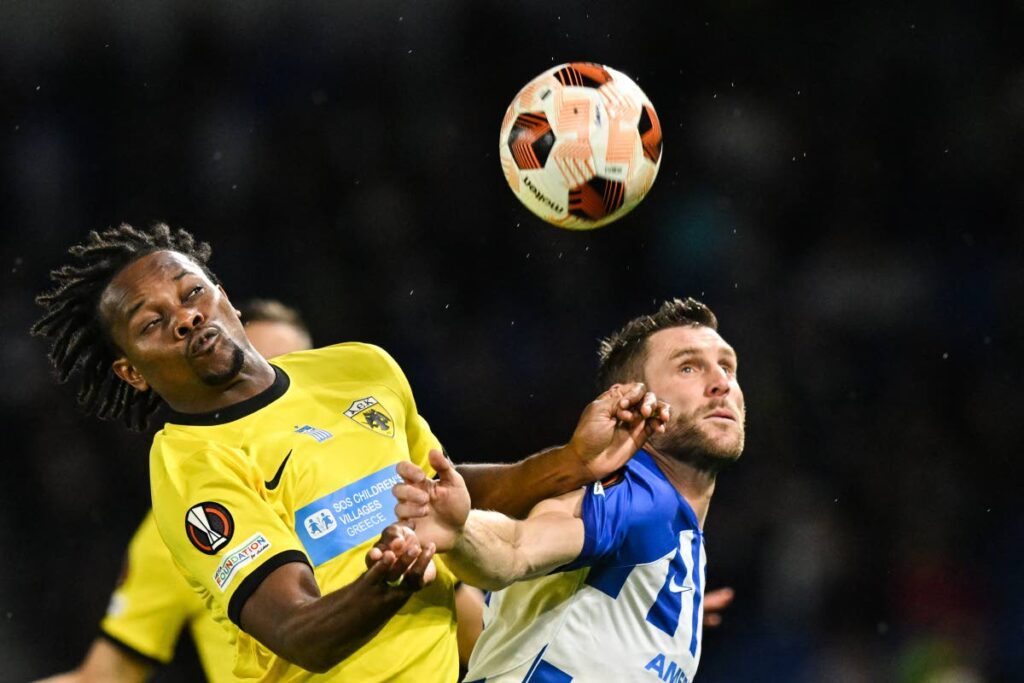 AEK's Trinidad forward Levi Garcia (L) fights for the ball with Brighton's English midfielder James Milner during an UEFA Europa League Group B match at the American Express Community Stadium in Brighton, southern England back in September. FILE PHOTO
  - AFP PHOTO