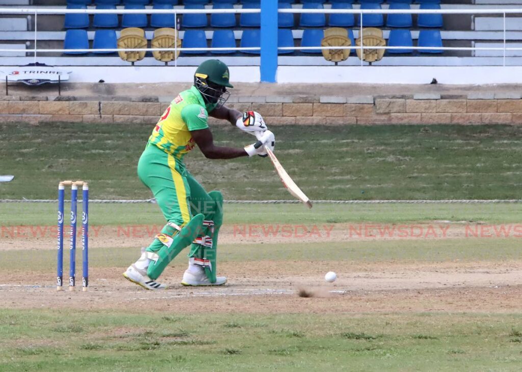 Windward Islands Volcanoes’s Andre Fletcher plays a shot against the Leeward Islands Hurricanes during the regional Super50 match, on Tuesday, at the Queen’s Park Oval, St Clair.  - ROGER JACOB