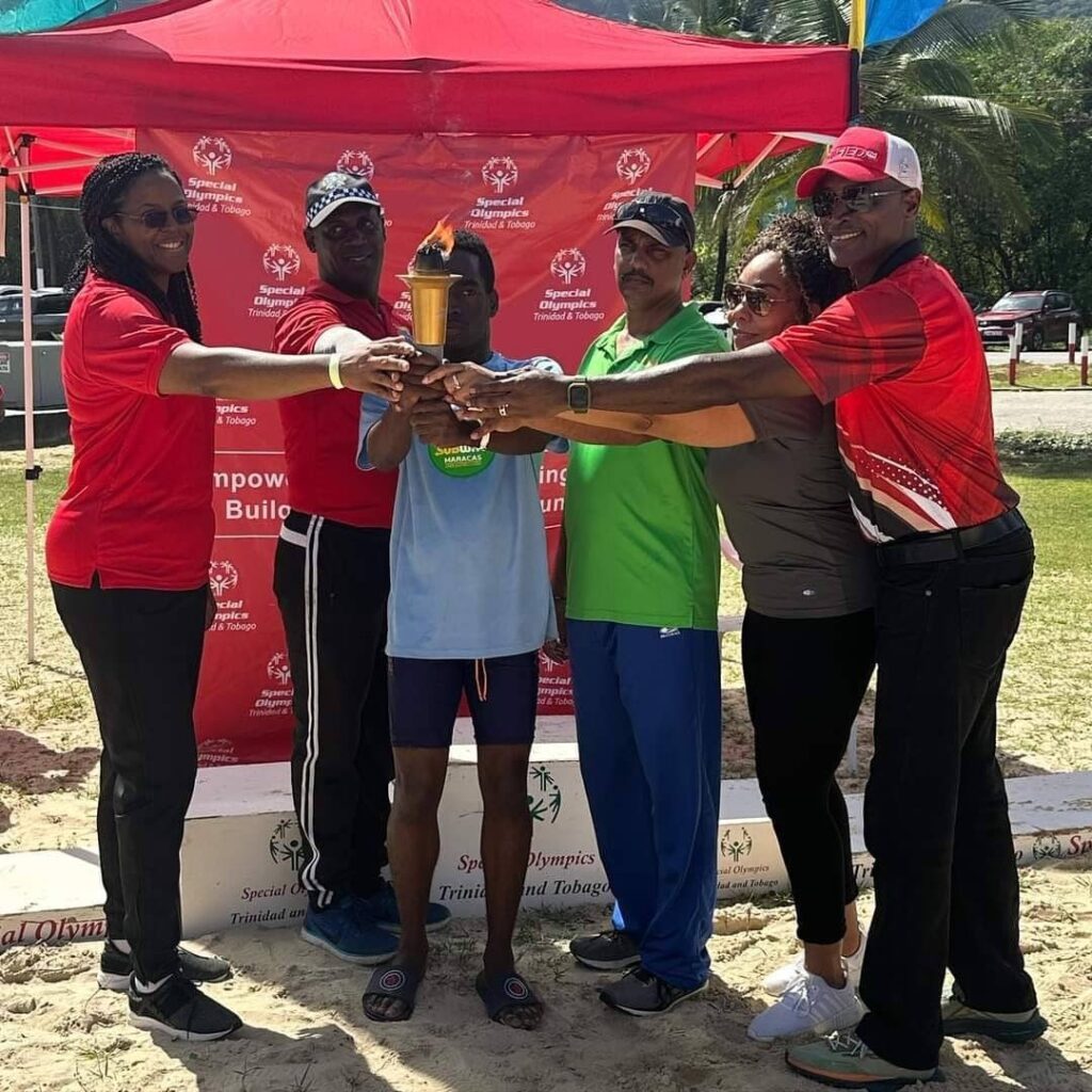 Special Olympics athletes and organisers at the Beach Games at Maracas Beach on Saturday. - Jelani Beckles