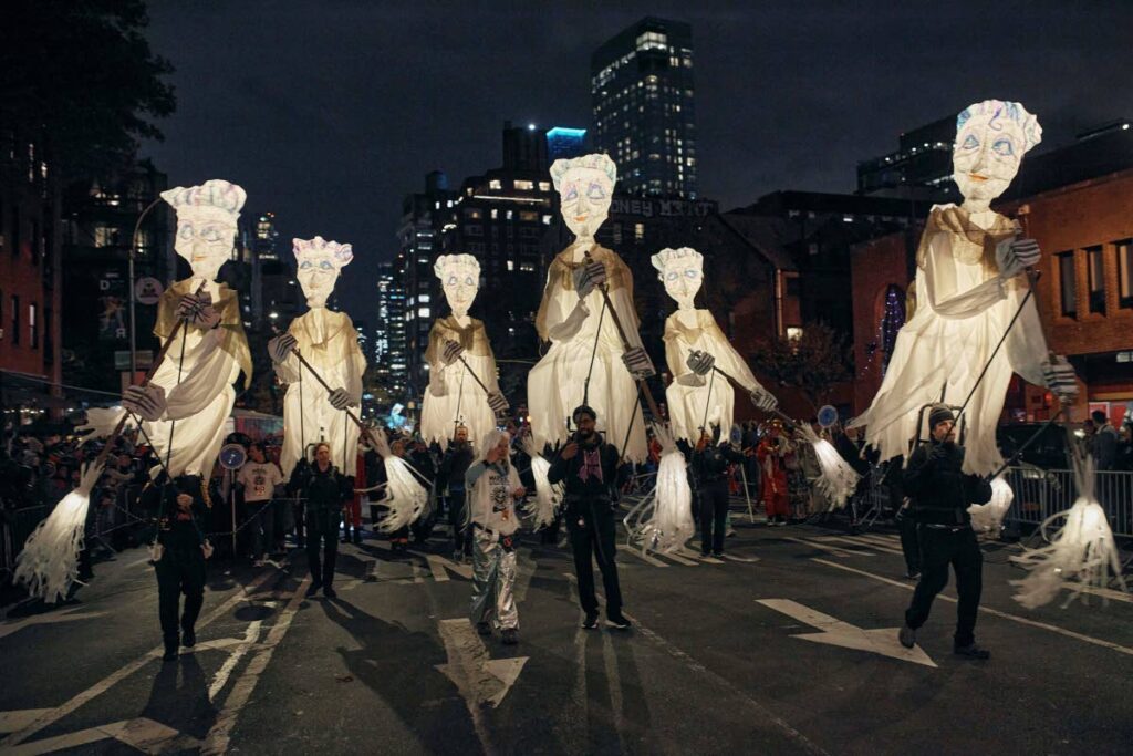Revellers march along Sixth Avenue during the Village Halloween Parade in New York. AP PHOTO - 
