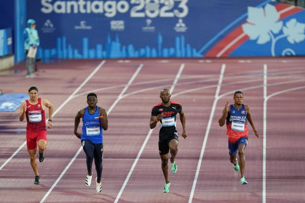 Sprinters, from left, Mexico’s Cesar Ramirez, Colombia’s Carlos Palacios, Trinidad and Tobago’s Kyle Greaux and Dominican Republic’s Yancarlos Martinez compete in a men’s 200-meter semifinal at the Pan American Games in Santiago, Chile, on Wednesday.  - AP PHOTO