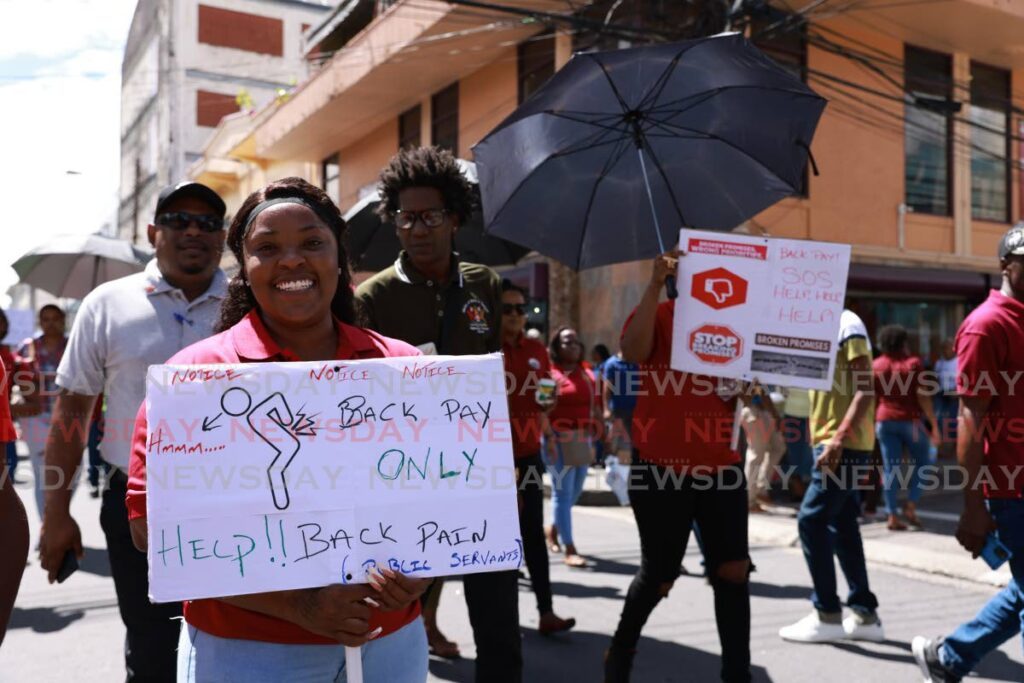 National Trade Union Centre (NATUC) members march through Port of Spain on November 3 - Jeff K. Mayers