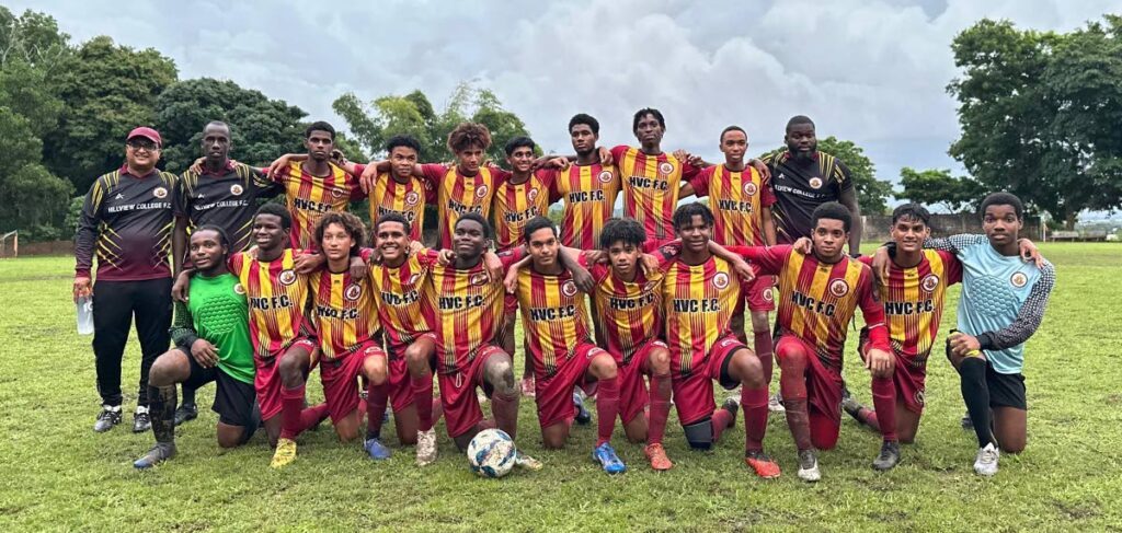 Hillview College under-20 football team with their coaches and manager after a game at their school ground, El Dorado Road, Tunapuna. - 