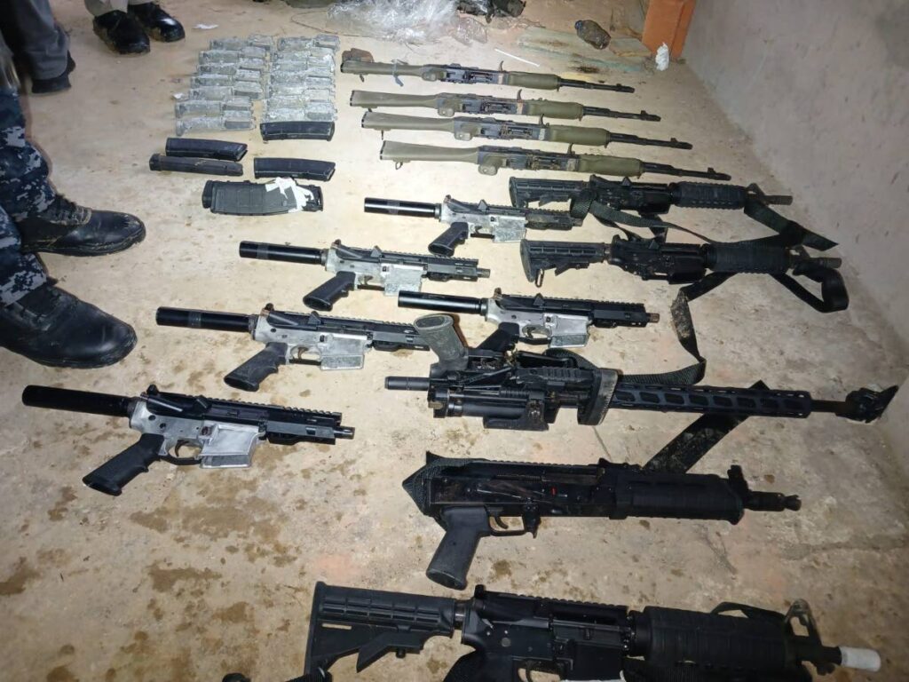 Some of the weapons seized by police in Princes Town on Friday.  - Photo courtesy TTPS