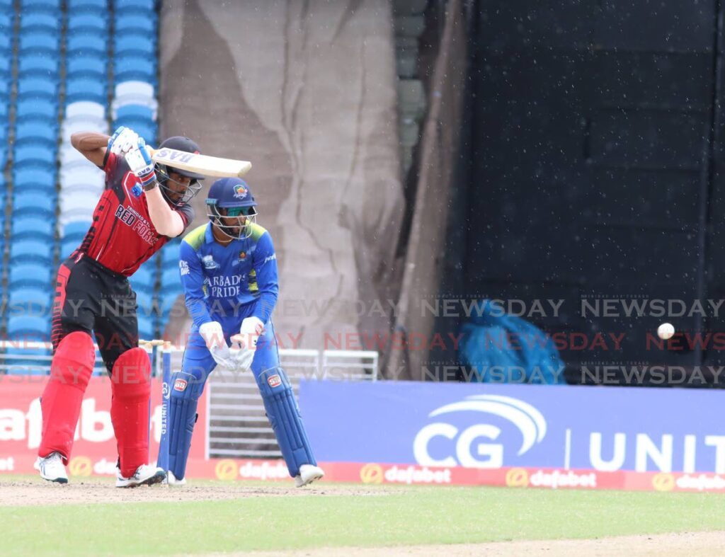 Kjorn Ottley drives through the covers against the Barbados Pride on Sunday at the Brian Lara Cricket Academy in Tarouba. PHOTO BY ANGELO MARCELLE - Angelo Marcelle