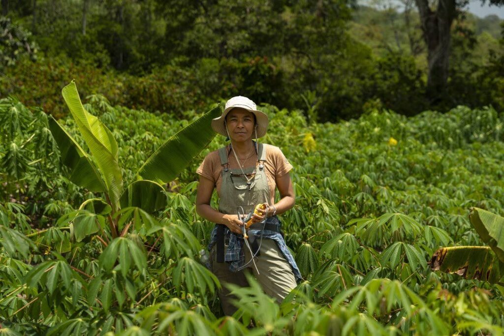 Sarah Bharath is happy in a green field. - Photo by Ricardo Messon