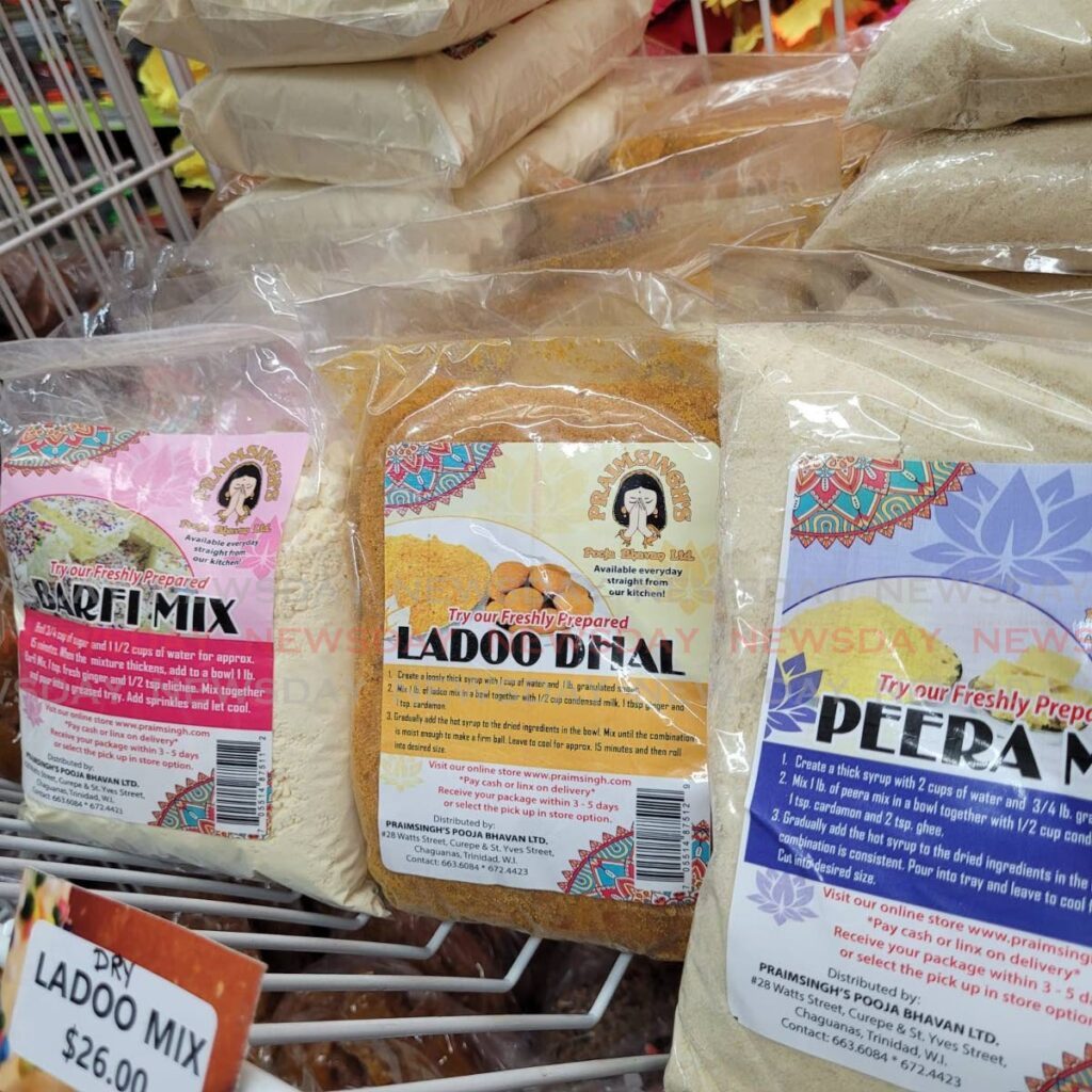 Barfi mix and ladoo dhal on sale at Praimsingh's in Curepe.