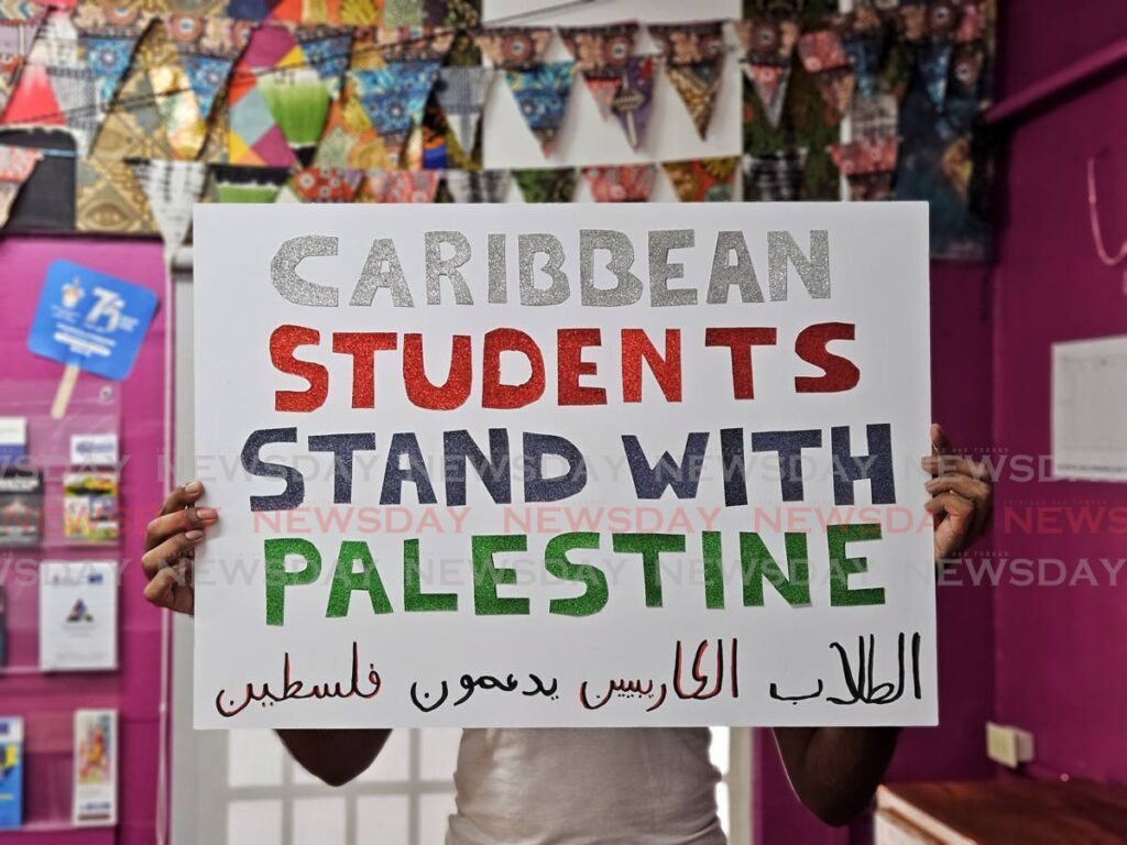 St Augustine students stage their own protest action in support of Palestine. - 