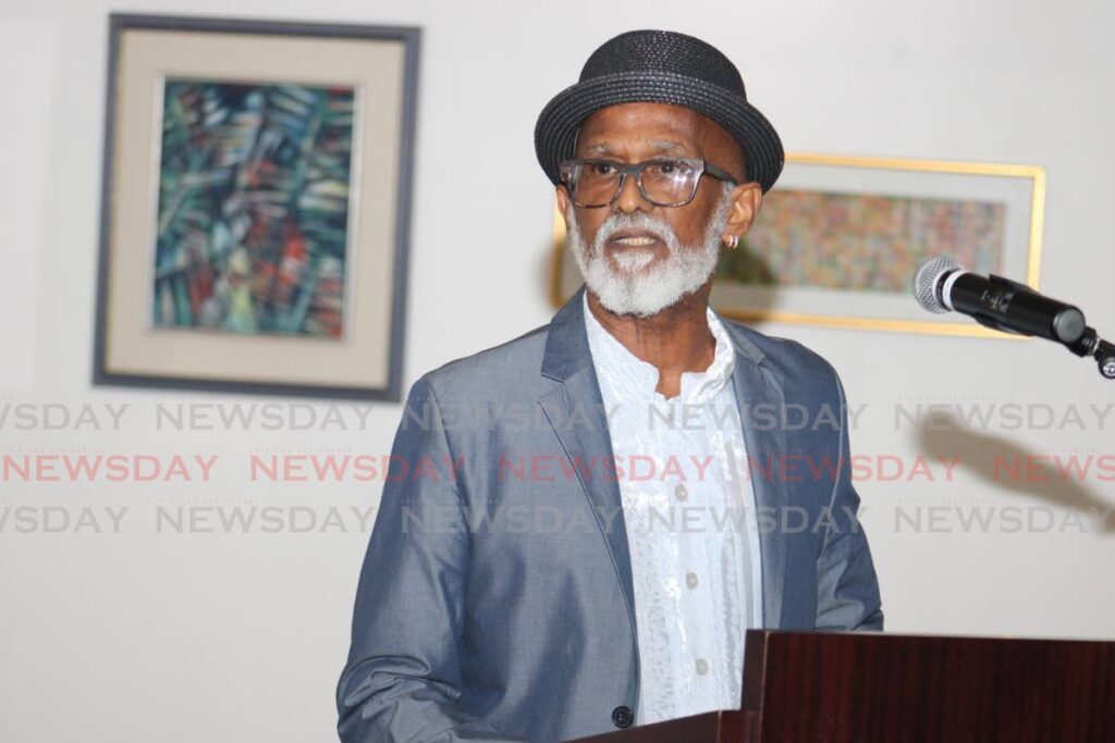 Kinetic artist Guy Beckles at the launch of Symphonic Synchrony, an exhibition featuring original work by Backles, as well as collaborative pieces with some of TT's top artists. The exhibition runs until November 30 at the Central Bank, Port of Spain.  - Photo by Grevic Alvarado