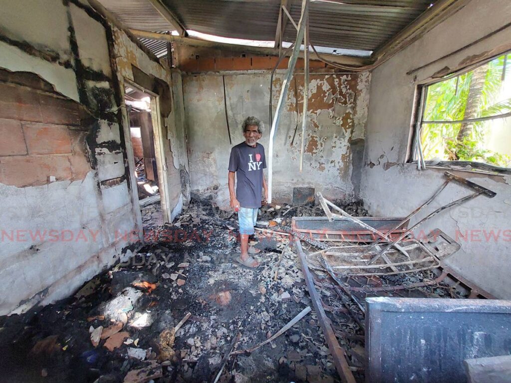 HOMELESS: Peter Bahadoor, 71, in one of the rooms of his Mafeking Village, Mayaro house which was destroyed in an arson attack during the early morning hours on November 13. - Photo by Lincoln Holder