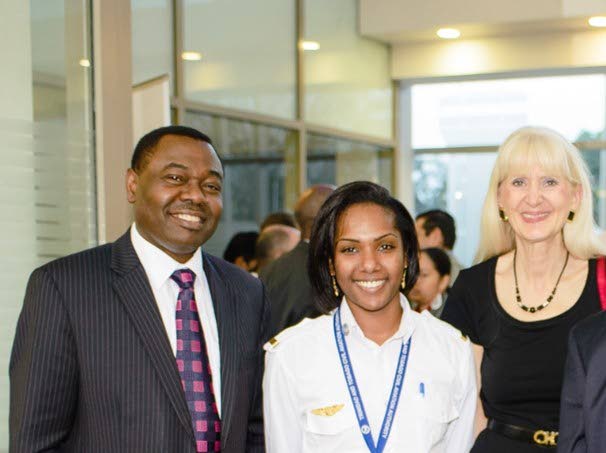 Akelia Scott (centre) with ICAO president Dr Olumuyiwa Bernard Aliu and ICAO regional director  Loretta Martin. - 