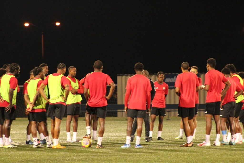 TT head coach Angus Eve(C) speaks with his players on Tuesday during a training session in Austin, Texas ahead of Thursday’s Concacaf Nations League quater-final against the US. - TTFA Media 