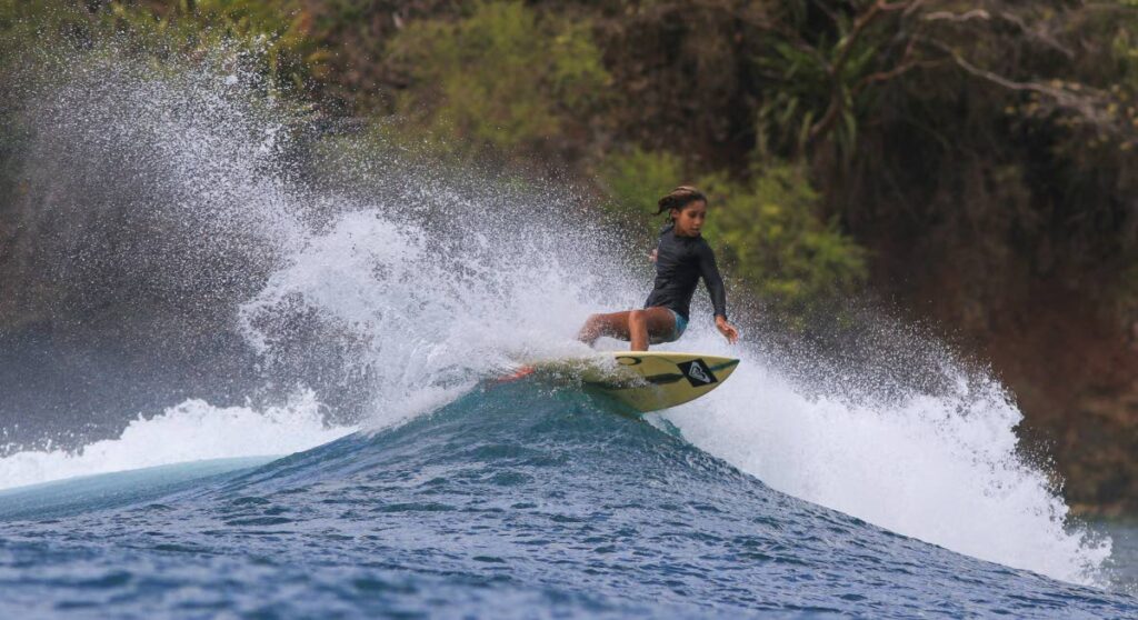 Cheyenne Patino-Ubeda surfs at Mt Irvine Bay, Tobago. - Bhajan Sport Photo.