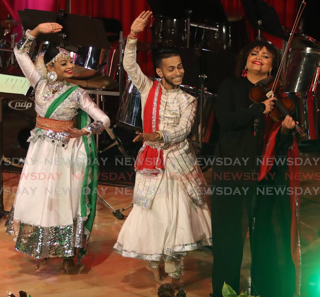 Members of the Suryamika dance group and violinist Inge Schluer perform at the Lights of Trinidad media launch, Government Campus Plaza, Port of Spain on Friday. - Photo by Angelo Marcelle