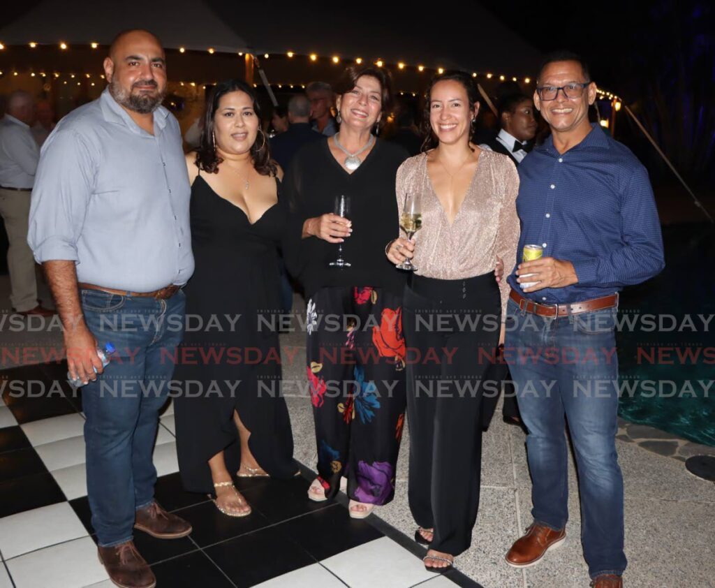RUGBY FAMILY: (From left) Stag Trinidad Northern Rugby Club president Brad Soulette, Keisha Soulette, Gillian Chee Ping, Meagan Ifill and Rhett Chee Ping, at the club’s 100th anniversary celebrations at Drew Manor, Santa Cruz last Saturday.  Photo by Angelo Marcelle
