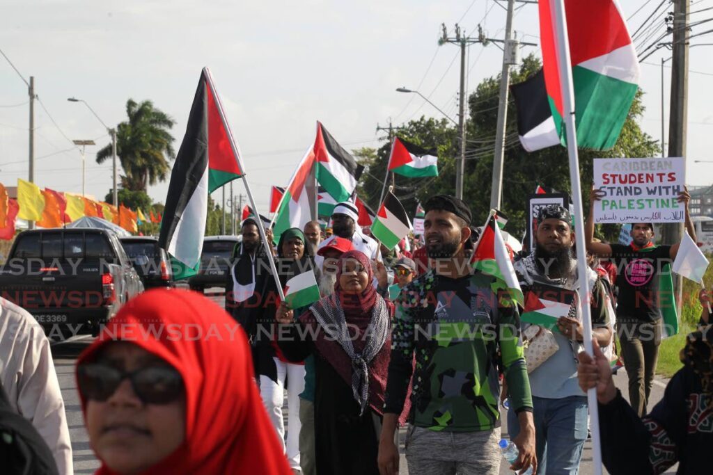 Concerned Muslims of TT and other supporters marched through the streets of Chaguanas to show solidarity for Palestine in the ongoing conflict with Israel  - Photo by Lincoln Holder