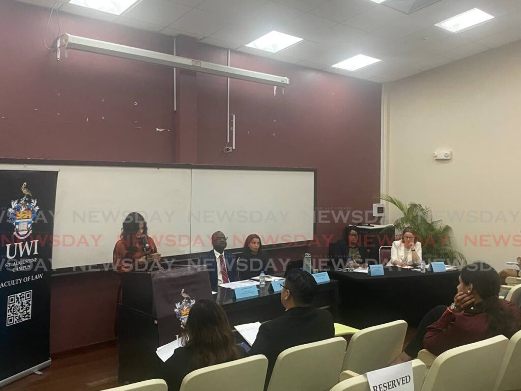 (From left) Denise Pitcher, executive director of the Caribbean Centre for Human Rights, Eden Charles, former ambassador for TT to the UN in New York, Justice Nalini Singh, Dean of UWI, St Augustine's Law Faculty Dr Alicia Elias-Roberts and UN resident co-ordinator Joanna Kazana at a panel discussion on human rights at the Noor Hassanali Auditorium at UWI.  - Narissa Fraser