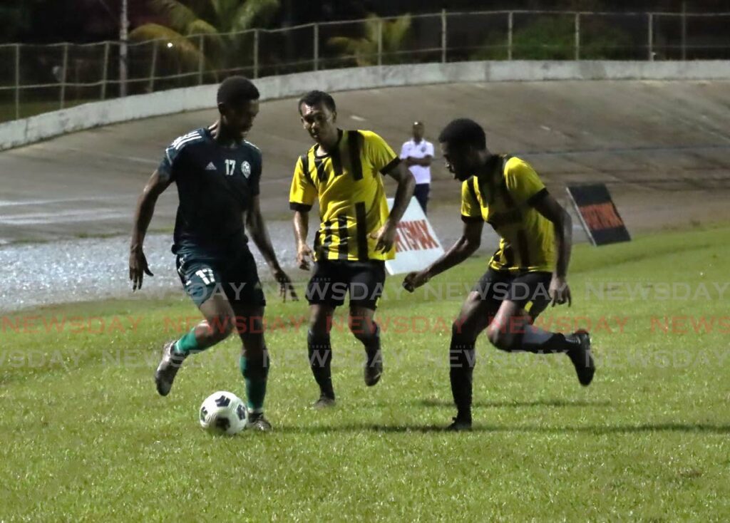 Prisons FC's Josiah King controls the ball against Central FC during the TT Premier Football League match, on Sunday night, at the Arima Velodrome.  - Roger Jacob