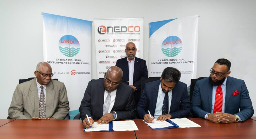 Nedco chairman Clarry Benn, left, Nedco CEO Calvin Maurice, Labour Minister and MP for La Brea Stephen Mc Clashie, Labidco general manager (Ag) Terrence Boodoosingh and Labidco chairman Dr Joseph Khan at the MoU signing on Friday. - 