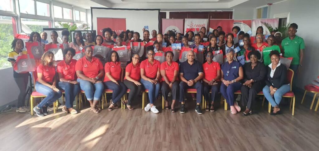 NAAATT president George Comission (seated fifth from right) is pictured with partcipants of Saturday's women's seminar/workshop called Empower Her.  - courtesy NAAATT