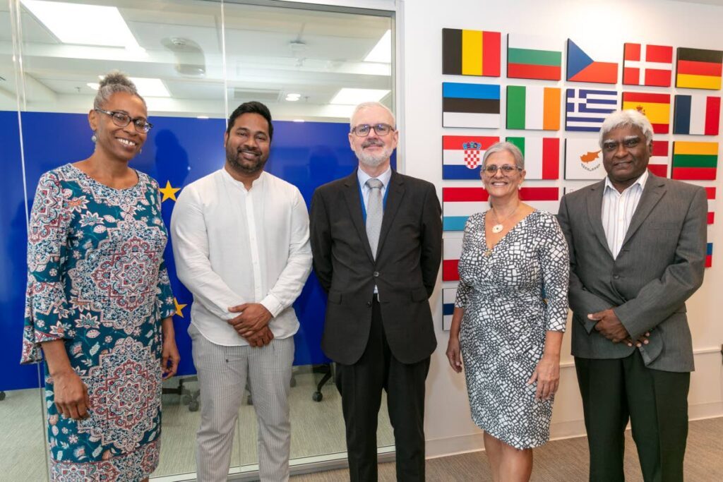 Ambassador of the European Delegation to TT Peter Cavendish, centre, with (from left) partner CSOs Colleen David of Veni Apwann and Omar Mohammed of the Cropper Foundation; partner CSOs Nicole Leotaud of CANARI and Bertrand Bhikarry of Environment Tobago following the signing of the grants at the EU’s office in Port of Spain. - 