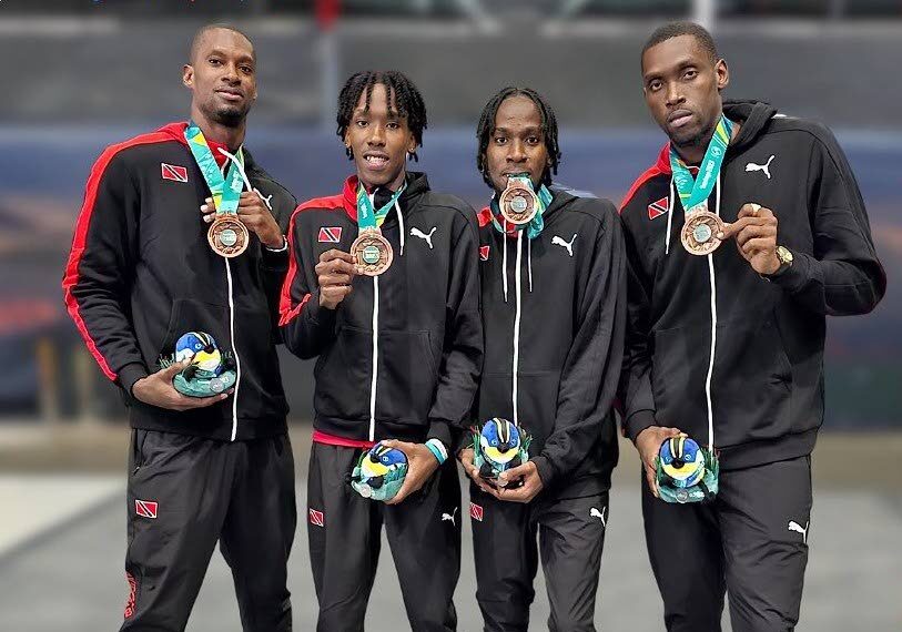 TT 3x3 men’s basketballers (from left) Chike Augustine, brothers Ahkeel and Ahkeem Boyd, and Moriba de Freitas with their Pan Am Games bronze medals in Santiago, Chile.  - File photo