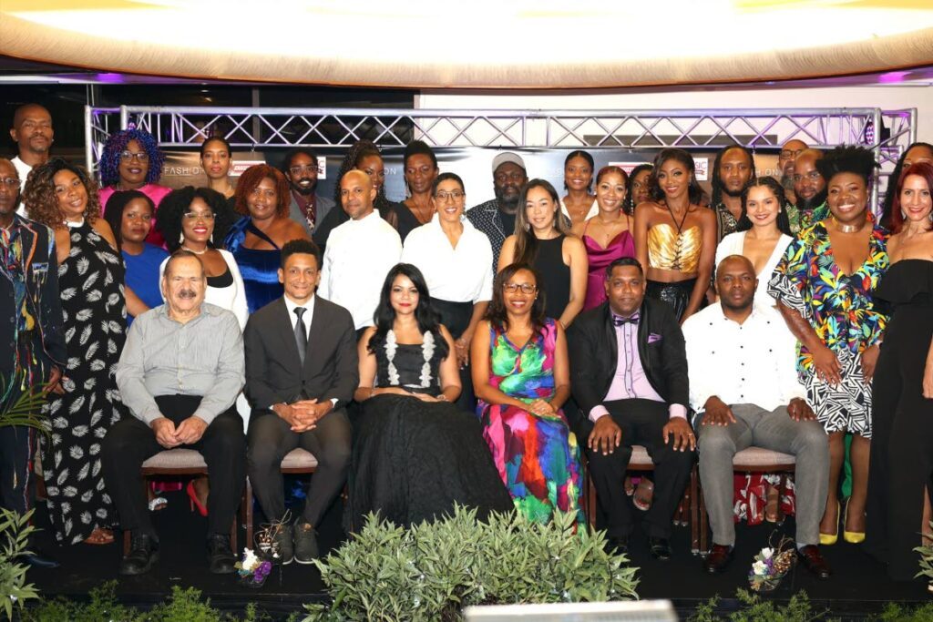 Professor Clement Imbert, chairman of UTT; Jason Lindsay, chairman of FashionTT; Lisa-Marie Daniel, general manager, FashionTT; DrAcolla Cameron, dean Social Sciences, UWI;  Nyron Mohammed, director of Industry, Ministry of Trade and Industry; Roger Roach, president of TTMA and graduating designers.
 - 