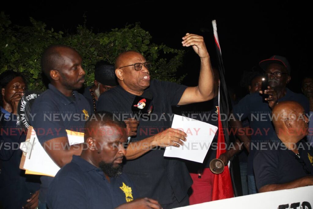 President general of the OWTU Ancil Roget address members as they mark the fifth anniversary of the closure of Petrotrin with a walk and gathering at Pointe-a-Pierre roundabaout on Thursday.  - LINCOLN HOLDER 